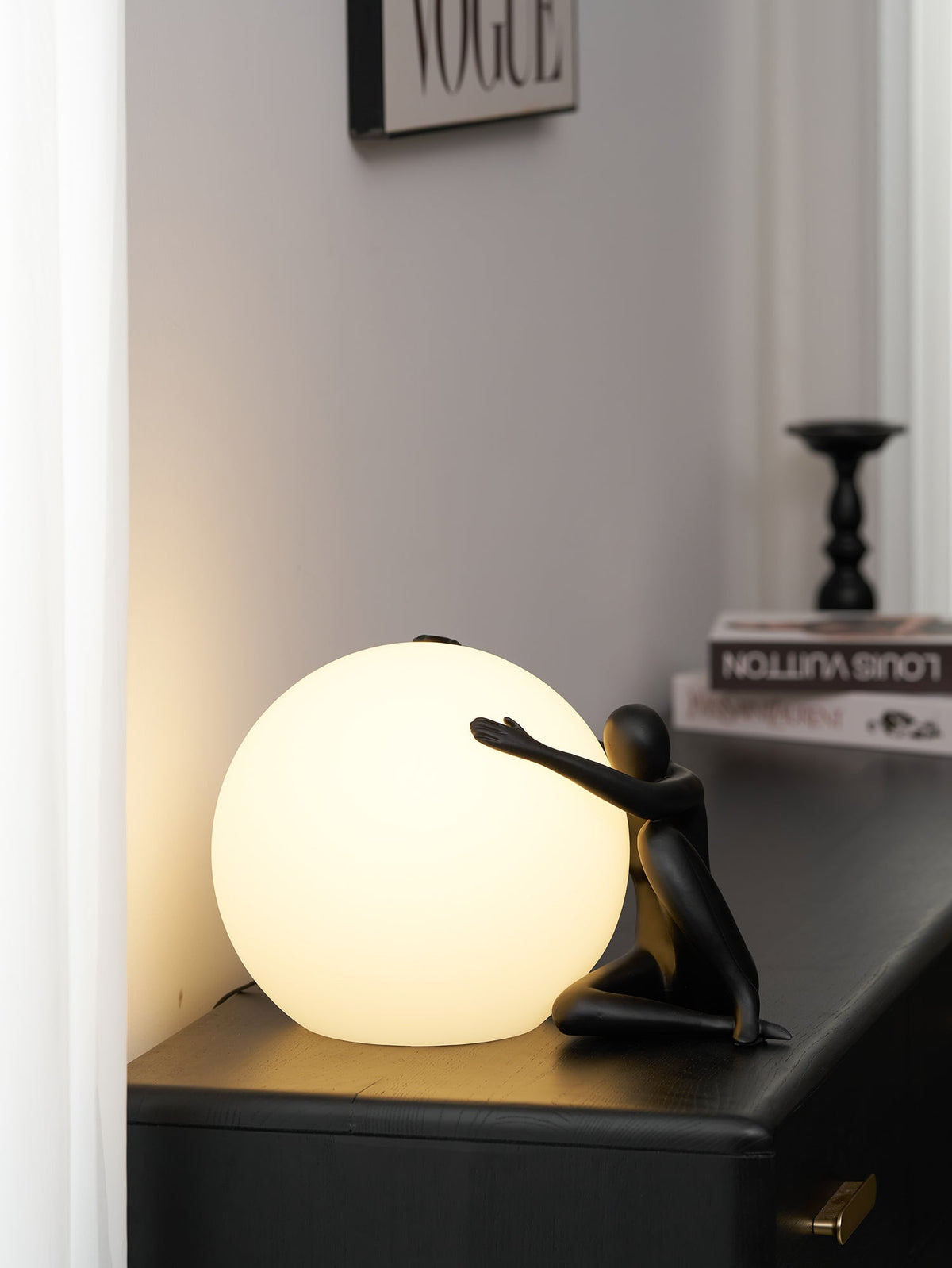 Humanoid Ball Holding Table Lamp