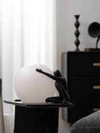Humanoid Ball Holding Table Lamp