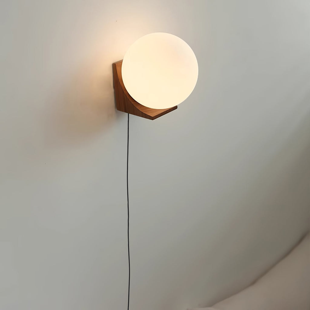 Evelyn Orb Plug - in Wall Lamp
