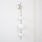Vertical Globe Plug - in Wall Lamp